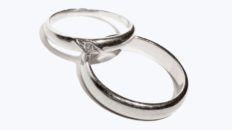 Platinum wedding bands with patina, symbols of love and commitment