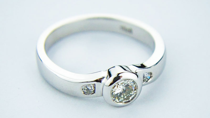 An engagement ring plated with rhodium.