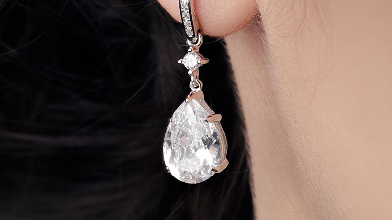 Pear shape diamond earring.