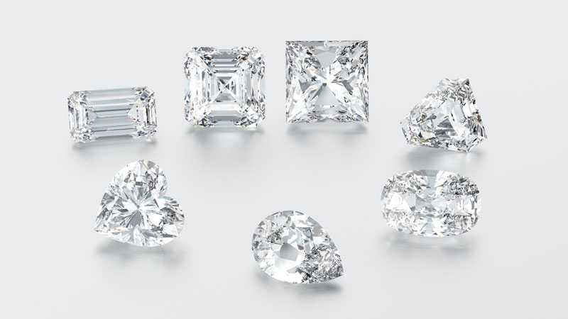 Fancy diamond design shapes include the heart shaped diamond, Asscher cut diamond, cushion cut diamond, radiant cut diamond, oval cut diamond, marquise cut diamond, and pear shaped diamonds.