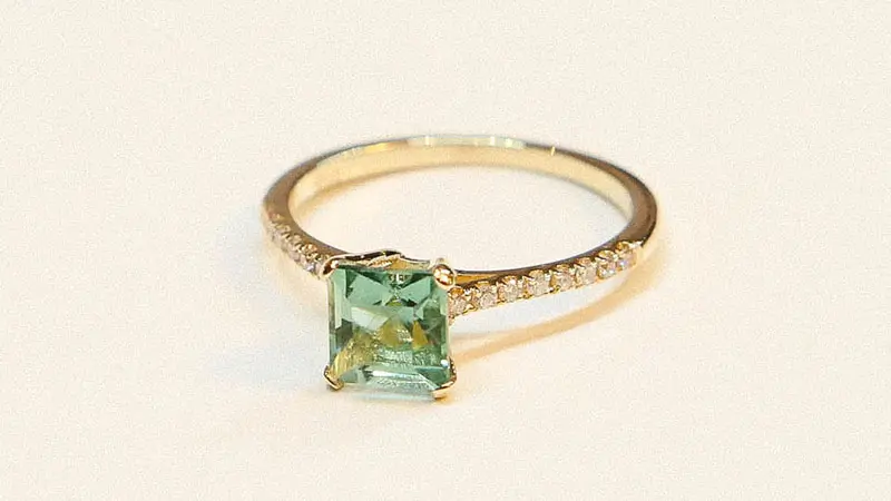 A green fancy color diamond engagement ring.