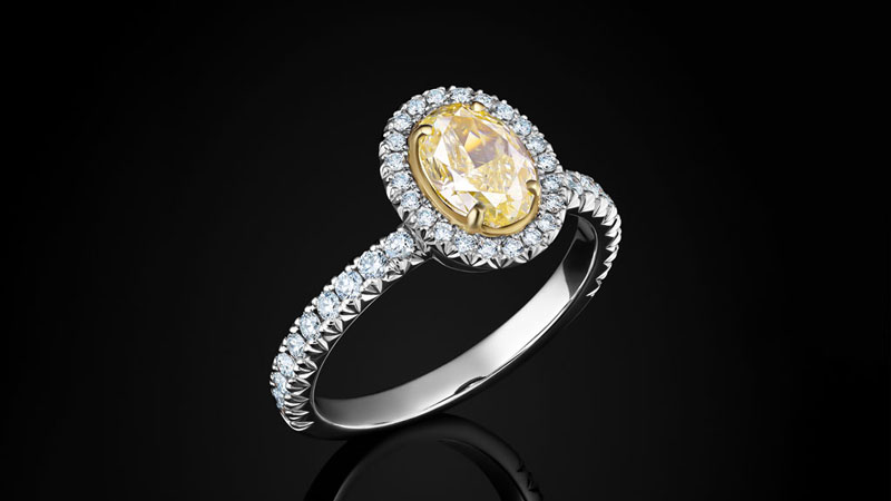 A fancy intense yellow diamond engagement ring.