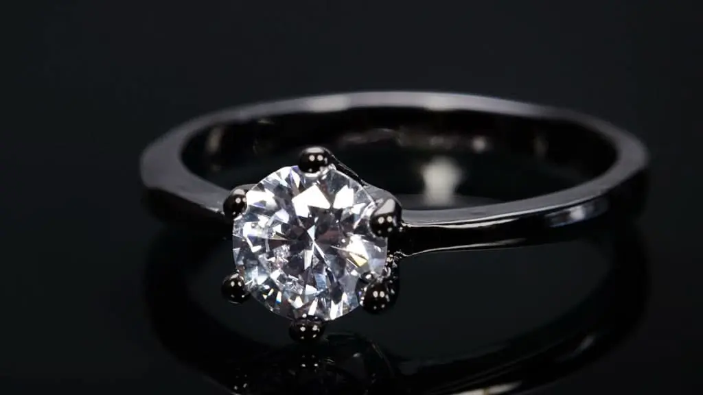 A black gold diamond engagement ring.