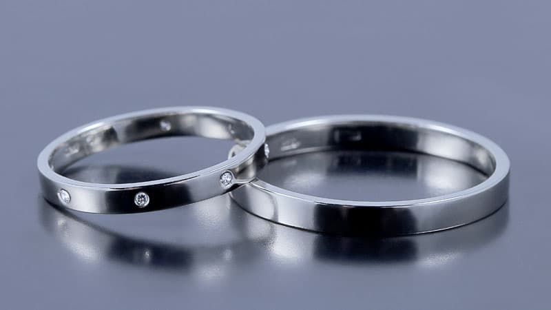 This black gold color on these jewelry items is the result of plating, which isn't permanent.