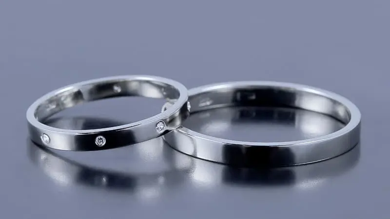 This black gold color on these jewelry items is the result of plating, which isn't permanent.
