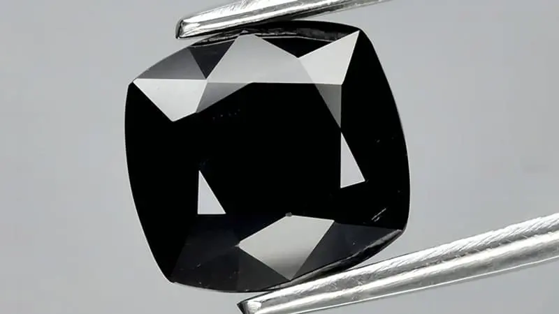 An opaque black sapphire.