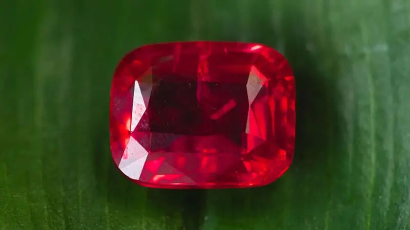 A fine cushion shape Burmese pigeon's blood ruby.