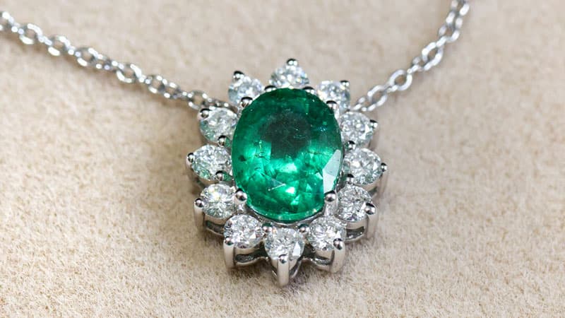 A necklace featuring a stunning Zambian emerald pendant.