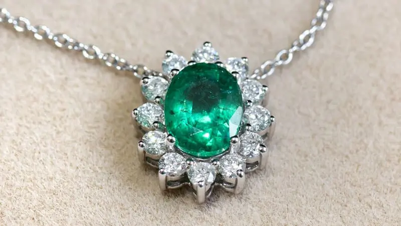 A necklace featuring a stunning Zambian emerald pendant.