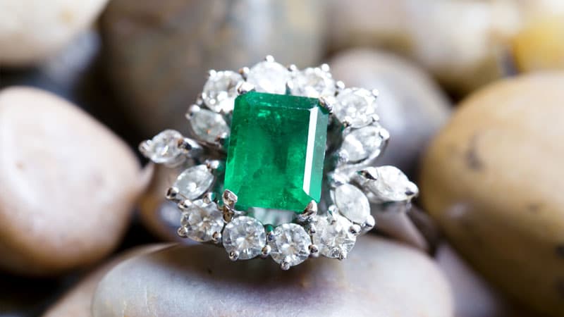 A statement ring with a Brazilian emerald gemstone on the brighter end of the tone scale.