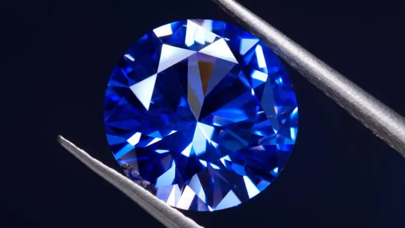 A lab-grown blue sapphire stone.
