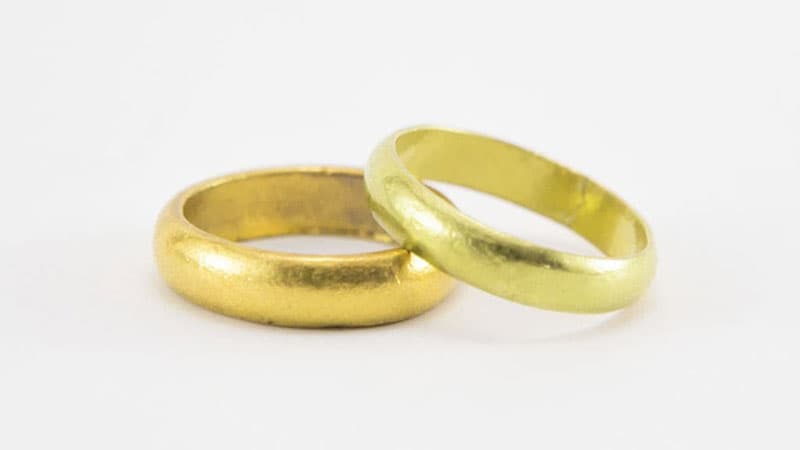 Yellow and green gold rings side by side